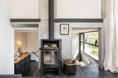 Coin salon dans l'établissement L'atelier - Charming House with swimming pool and garden