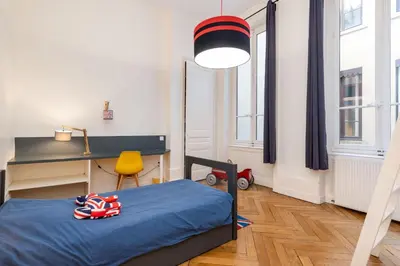 Un ou plusieurs lits dans un hébergement de l'établissement Les balcons de Fourvière - Apartment with view