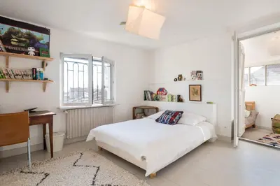 Un ou plusieurs lits dans un hébergement de l'établissement Maison Ré - chic and relaxed house with pool and garden