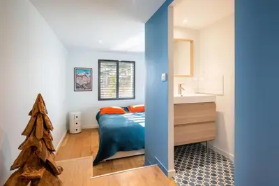 Un ou plusieurs lits dans un hébergement de l'établissement Les Muriers - Stunning wooden modern house