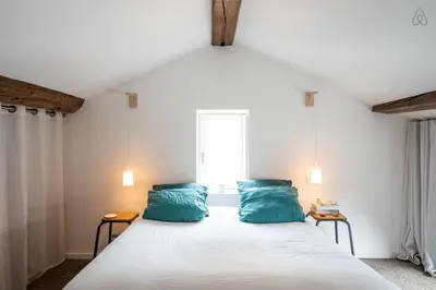 Un ou plusieurs lits dans un hébergement de l'établissement Le Duplex - Amazing flat overlooking the rooftops of Lyon
