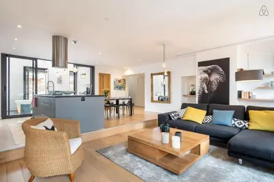 Coin salon dans l'établissement Le Duplex - Amazing flat overlooking the rooftops of Lyon