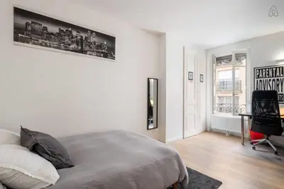 Un ou plusieurs lits dans un hébergement de l'établissement Le Duplex - Amazing flat overlooking the rooftops of Lyon