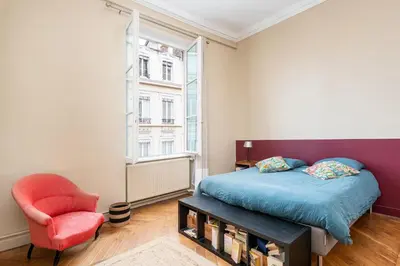 Un ou plusieurs lits dans un hébergement de l'établissement L'Authentique - Appartement en coeur de ville