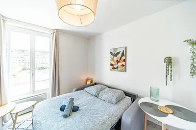 Coin salon dans l'établissement Le Petit Clément - Charmant et Cosy