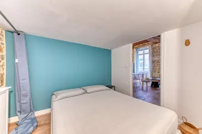 Un ou plusieurs lits dans un hébergement de l'établissement GuestReady - A classy stay in the heart of Lyon