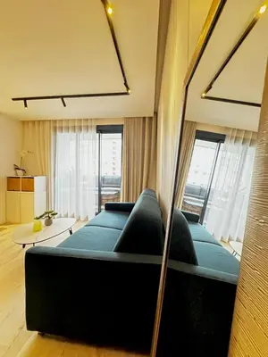 Un ou plusieurs lits dans un hébergement de l'établissement Blue King Suite - Triangle d'Or