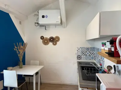 Cuisine ou kitchenette dans l'établissement Studio Cosy Proche Centre Ville