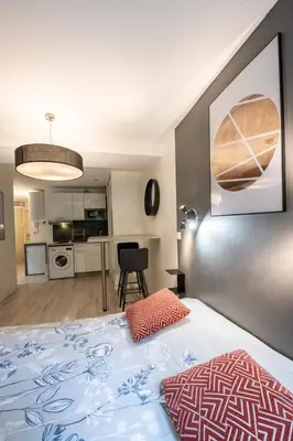 Un ou plusieurs lits dans un hébergement de l'établissement Central Part-Dieu - Appartement 2