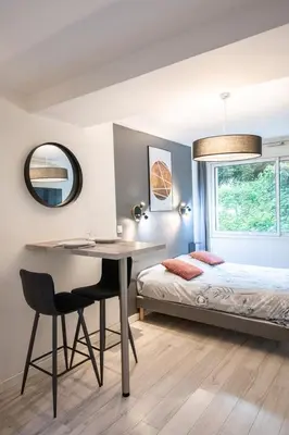 Un ou plusieurs lits dans un hébergement de l'établissement Central Part-Dieu - Appartement 2