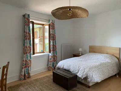Un ou plusieurs lits dans un hébergement de l'établissement Maison de charme, Maison carrée