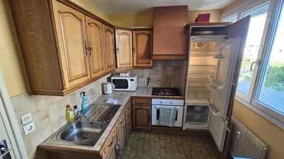 Cuisine ou kitchenette dans l'établissement Tram 50 m, Balcon, Parking facile