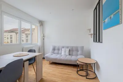 Coin salon dans l'établissement LE LAC - Appartement 15' Partdieu et Bellecour