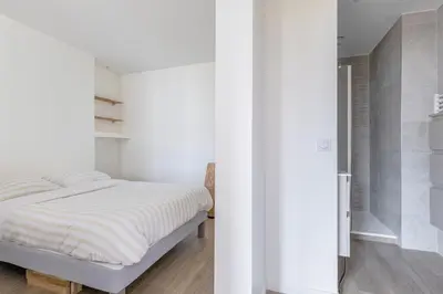 Un ou plusieurs lits dans un hébergement de l'établissement LE LAC - Appartement 15' Partdieu et Bellecour