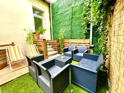 Coin salon dans l'établissement BnGo I Maison Mimosa I Jardin, 3 chambres, 9 personnes