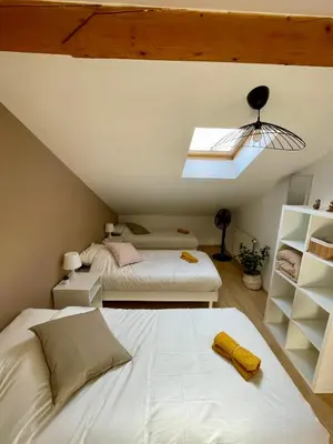 Un ou plusieurs lits dans un hébergement de l'établissement BnGo I Maison Terracotta I Jardin, Garage, 3 chambres, 9 personnes