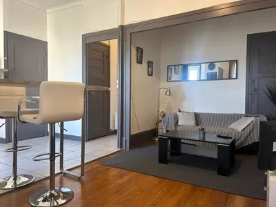 Coin salon dans l'établissement Spacieux cosy - 1 chambre Appartement - LYON Perrache Confluence 50 M2
