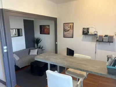 Cuisine ou kitchenette dans l'établissement Spacieux cosy - 1 chambre Appartement - LYON Perrache Confluence 50 M2