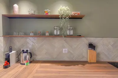 Cuisine ou kitchenette dans l'établissement Luxe et Design avec parking gratuit