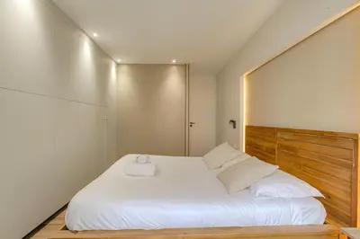 Un ou plusieurs lits dans un hébergement de l'établissement Luxe et Design avec parking gratuit