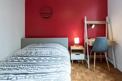 Un ou plusieurs lits dans un hébergement de l'établissement Appartement rénové pour 6 avec parking