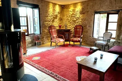 Coin salon dans l'établissement Château Frontonas gîte ferme