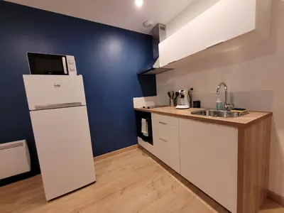 Cuisine ou kitchenette dans l'établissement T2 spacieux centre-ville