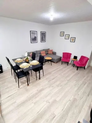 Coin salon dans l'établissement Appartement Neuf Rénové