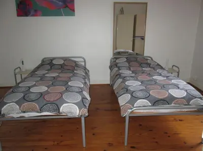 Un ou plusieurs lits dans un hébergement de l'établissement Appartement courte durée F1