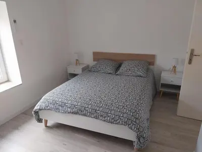 Un ou plusieurs lits dans un hébergement de l'établissement Appartement cosy et calme