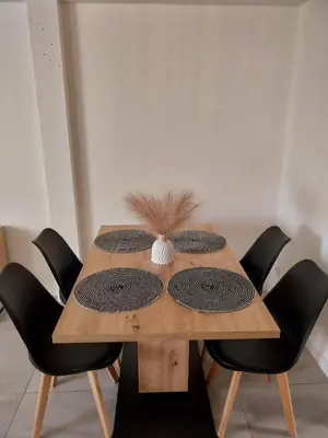 Coin salon dans l'établissement Appartement cosy et calme
