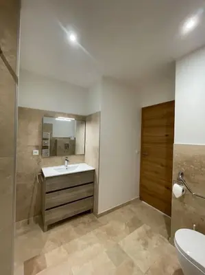 Salle de bains dans l'établissement L'Oxalis doré
