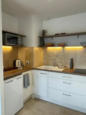 Cuisine ou kitchenette dans l'établissement L'Oxalis doré