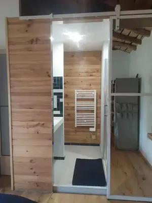 Cuisine ou kitchenette dans l'établissement Gîte avec jardin