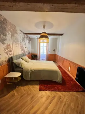 Un ou plusieurs lits dans un hébergement de l'établissement La Loge de l Odéon