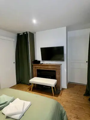 Télévision ou salle de divertissement dans l'établissement Studio cosy cœur de ville
