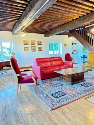 Coin salon dans l'établissement Séjourner au Château de la Roue Grand appartement 160 m2