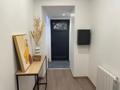Télévision ou salle de divertissement dans l'établissement Joli Appartement Saint-germain