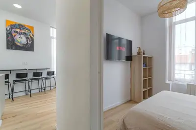 Un ou plusieurs lits dans un hébergement de l'établissement Selva, appartement cozy, Lyon 8ème