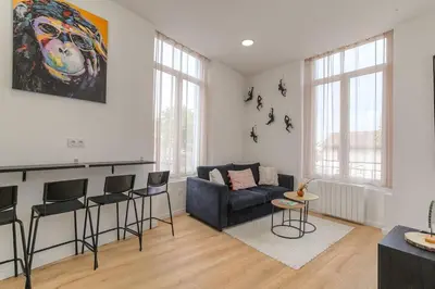 Coin salon dans l'établissement Selva, appartement cozy, Lyon 8ème