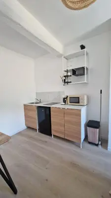 Cuisine ou kitchenette dans l'établissement Le Bourg