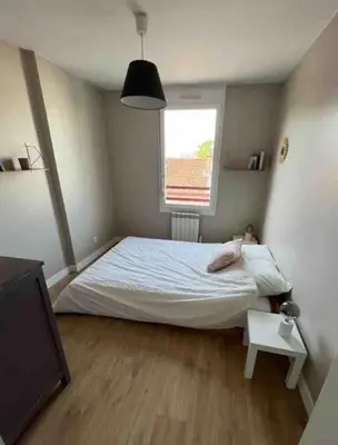 Un ou plusieurs lits dans un hébergement de l'établissement Appartement 2 chambres-garage Lyon Montchat