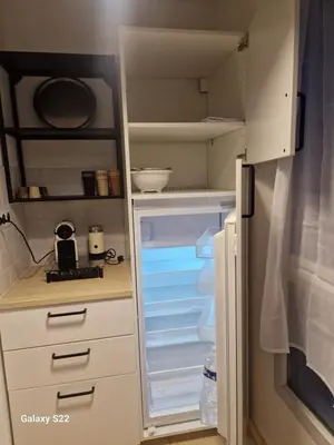 Cuisine ou kitchenette dans l'établissement Jardin D'Alexis