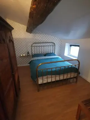 Un ou plusieurs lits dans un hébergement de l'établissement Appartement Cosy Traversant