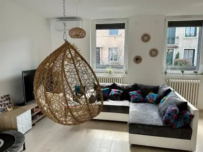 Coin salon dans l'établissement Agréable maison rénovée, en ville et au calme !