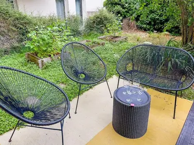 Jardin de l'établissement Appartement T2 avec jardin et parking