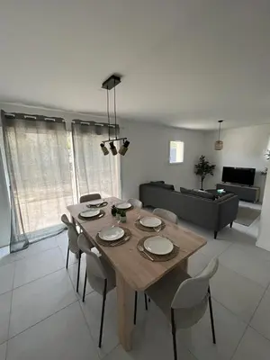 Coin salon dans l'établissement Maison Chaleureuse 2