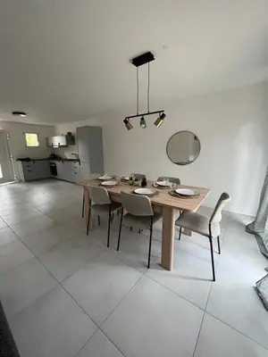 Cuisine ou kitchenette dans l'établissement Maison Chaleureuse 2