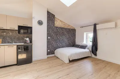 Cuisine ou kitchenette dans l'établissement Le Düsseldorf - Les appartements de l'olivier