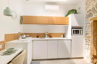 Cuisine ou kitchenette dans l'établissement Aux Voûtes de Granit - 10 mn Lyon